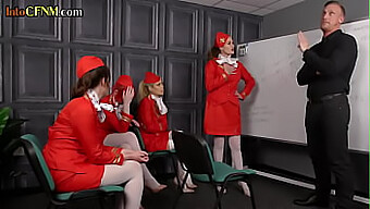 A Group Of Dominating Stewardesses In Uniform Engage In A Cfnm Orgy With A Man'S Penis